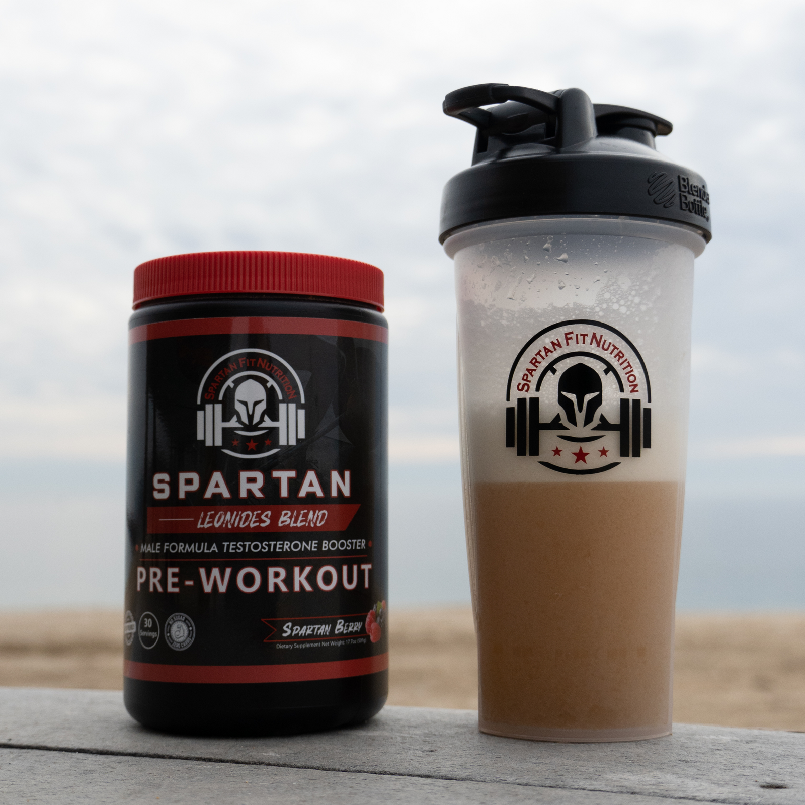 Leonidas Blend Pre-workout and Spartan Fit Shaker Bottle sitting on bench in Newport Beach