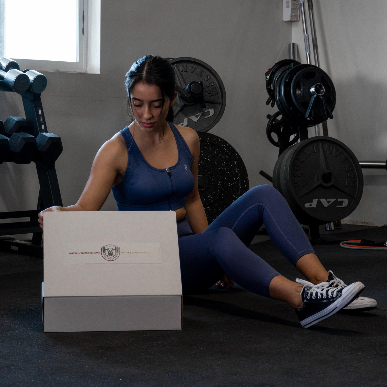 Home Gym Kit includes resistance bands, an ab roller, jump rope, shaker bottle, and sliders.