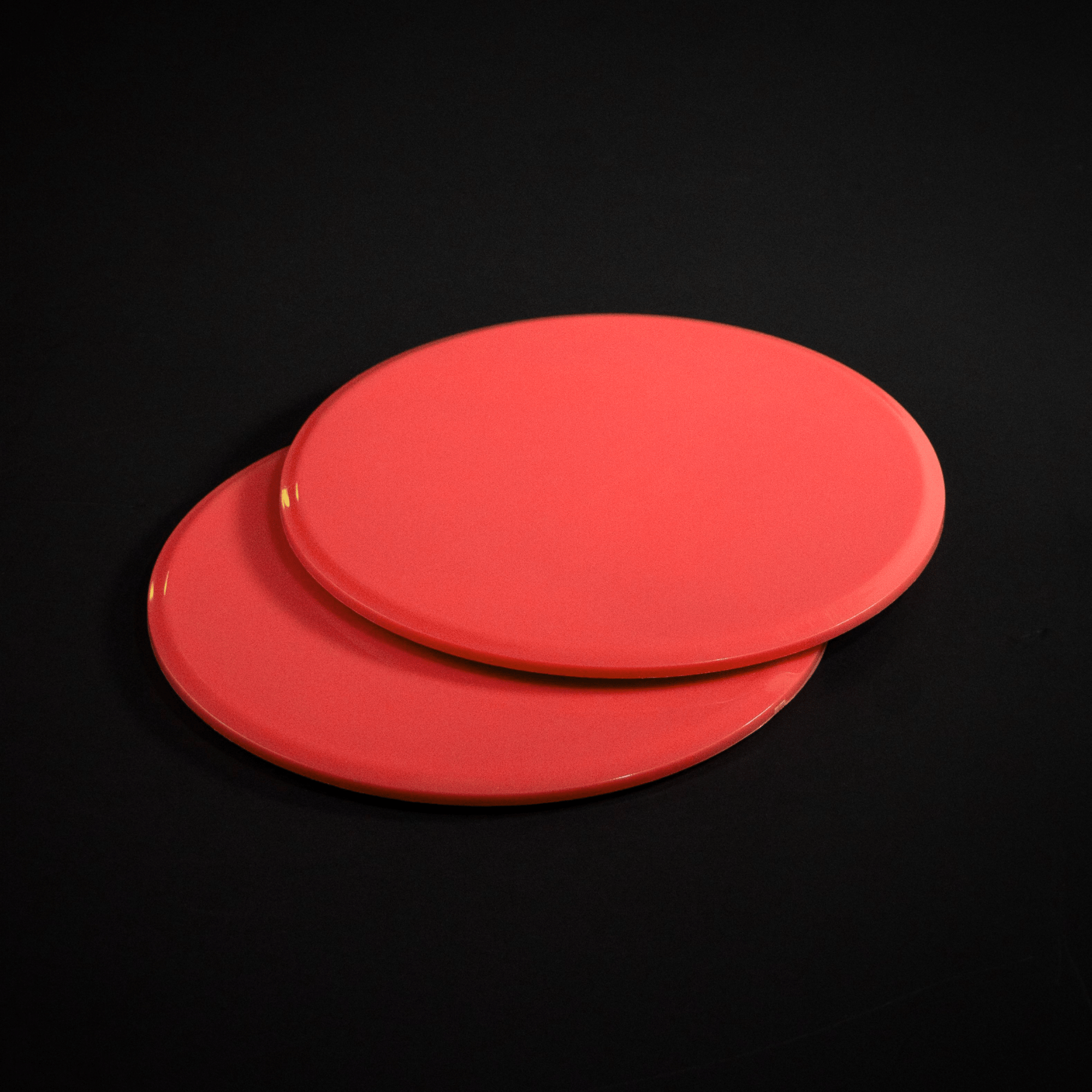 Red Core Sliding Discs on black background
