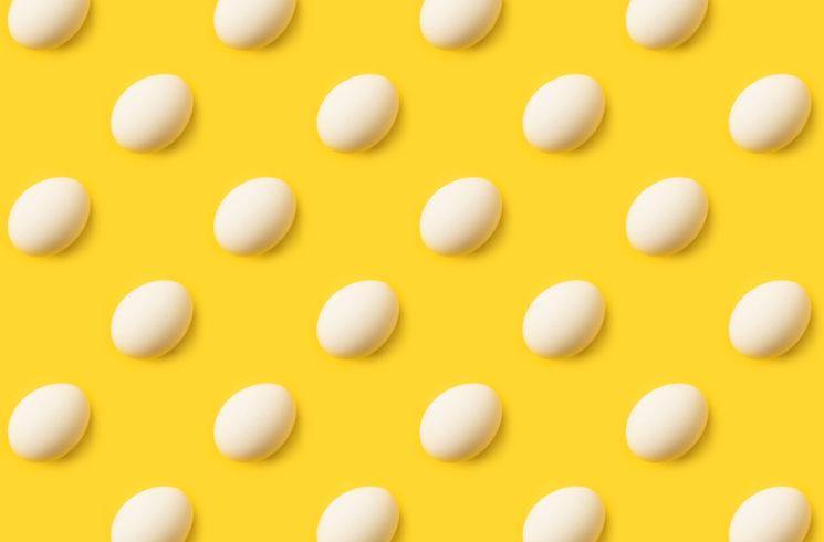 Yellow background with eggs that look like poka do