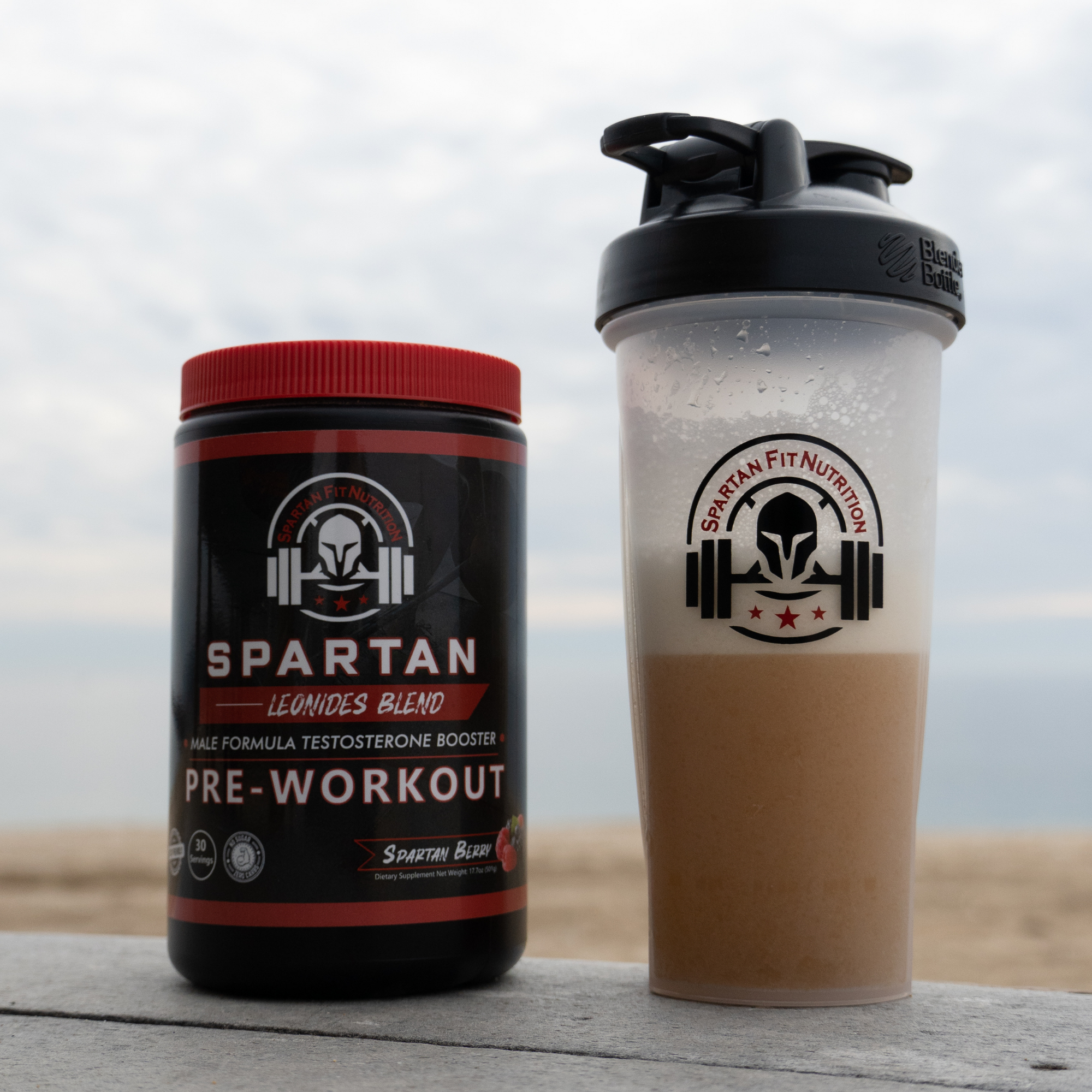 Leonidas Blend Pre-workout and Spartan Fit Shaker Bottle sitting on bench in Newport Beach 