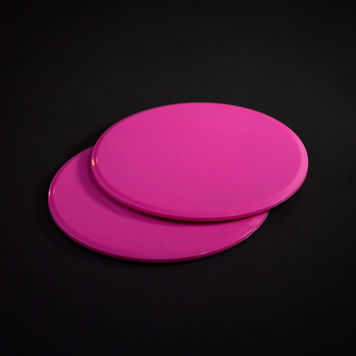Pink Core Sliding Discs on black background